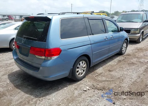 2010 Honda Odyssey Ex-L z USA, uszkodzony, nr VIN 5FNRL3H73AB074422
